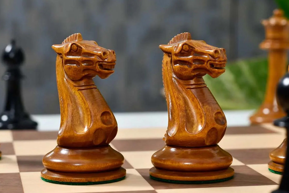 Wooden chess pieces on a chessboard